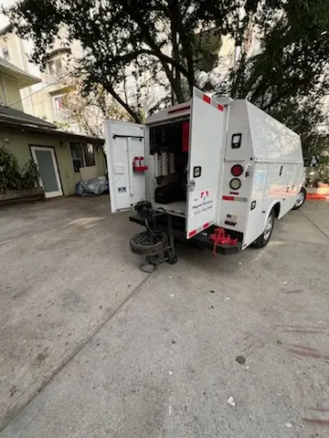 Magnet Plumbing service vehicle on-site for Grease Trap Cleaning in Seminole